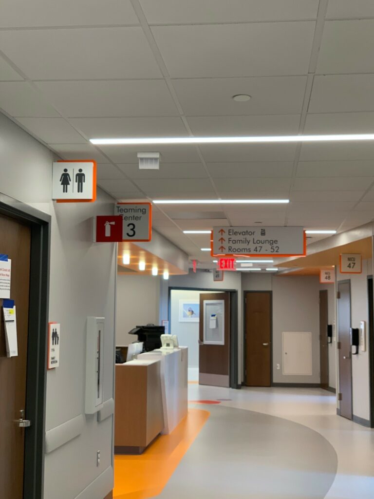 interior directional signs inside a children's hospital
