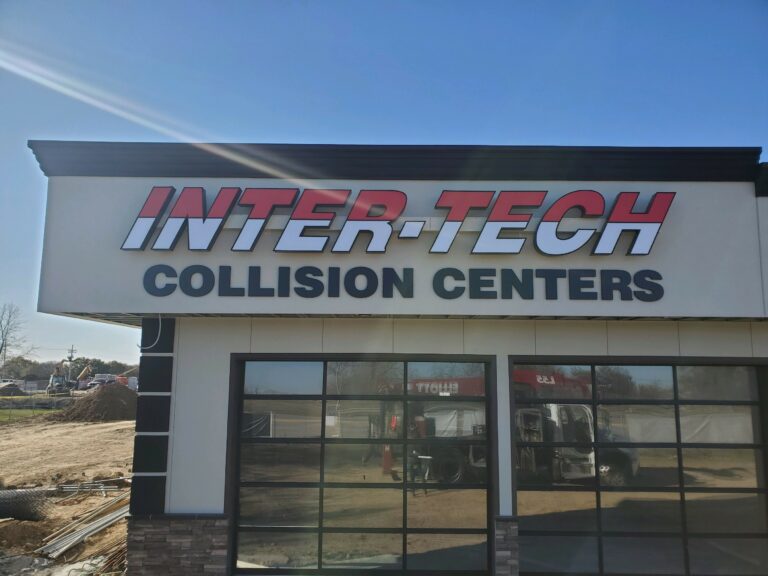exterior building sign displaying Inter-Tech Collision Centers logo
